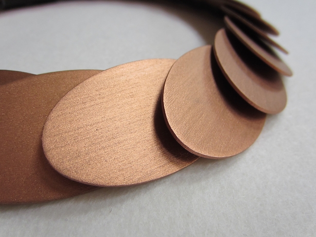 houten_ovalen_brond_detail